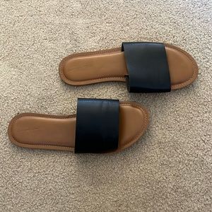 Black flat strap sandals